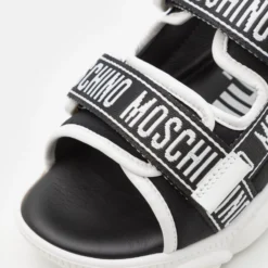 MOSCHINO Unisex - Sandalen - Black/White -Stijl Schoen Verkoopwinkel b50a9f373e1343f6a691772749a47e8c scaled