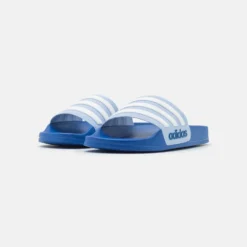 ADIDAS PERFORMANCE Adilette Shower Unisex - Badslippers - Blue Dawn/Footwear White/Team Royal Blue -Stijl Schoen Verkoopwinkel f3ed259e84d8457dba799d4cc522db8c scaled